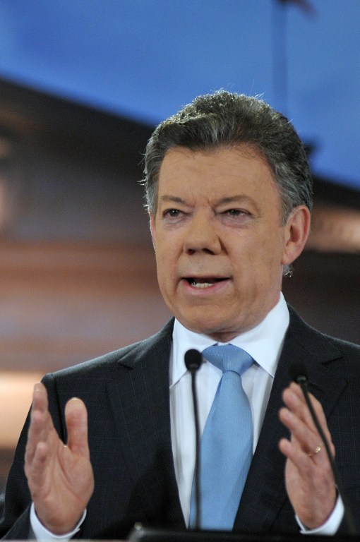Juan Manuel Santos faz discurso em que anuncia o início dos diálogos com as Farc. Foto: Presidencia-Cesar Carrion / AFP 