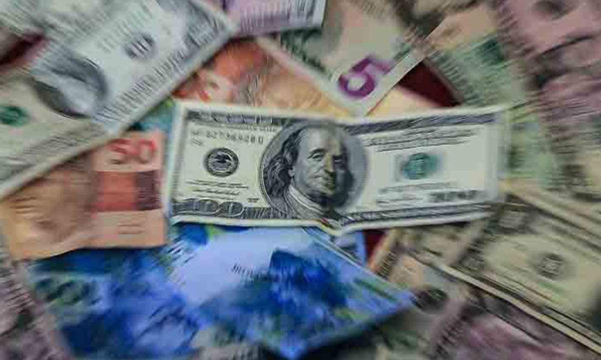 Bolsa tem leve alta e dólar oscila na casa dos R$ 5,20