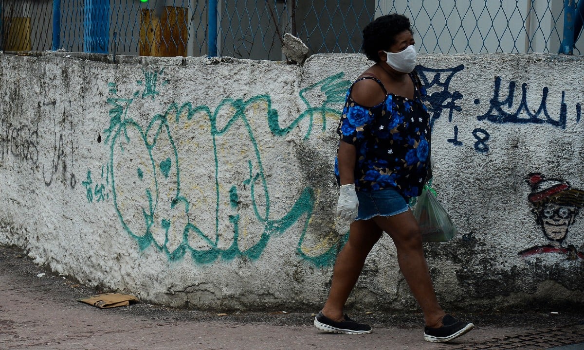 O uso de máscara havia sido adotado para evitar a contaminação pelo novo coronavírus Foto: Tomaz Silva/Agência Brasil 
