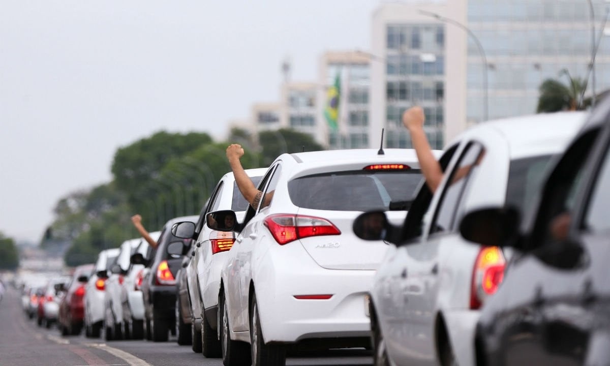 Motoristas de aplicativos protestam em Brasília 2017 contra regulamentação que restringia operação das plataformas no Brasil. Foto: MARCELO CAMARGO/AGÊNCIA BRASILFoto: MARCELO CAMARGO/AGÊNCIA BRASIL 