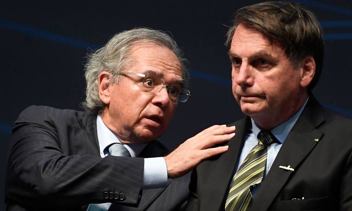 Paulo Guedes e Jair Bolsonaro. Foto: Mauro Pimentel/AFP 