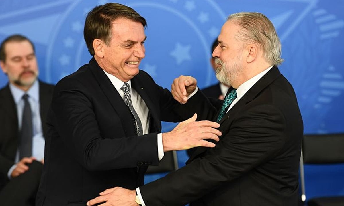 Jair Bolsonaro e Augusto Aras. Foto: Evaristo Sá/AFP 
