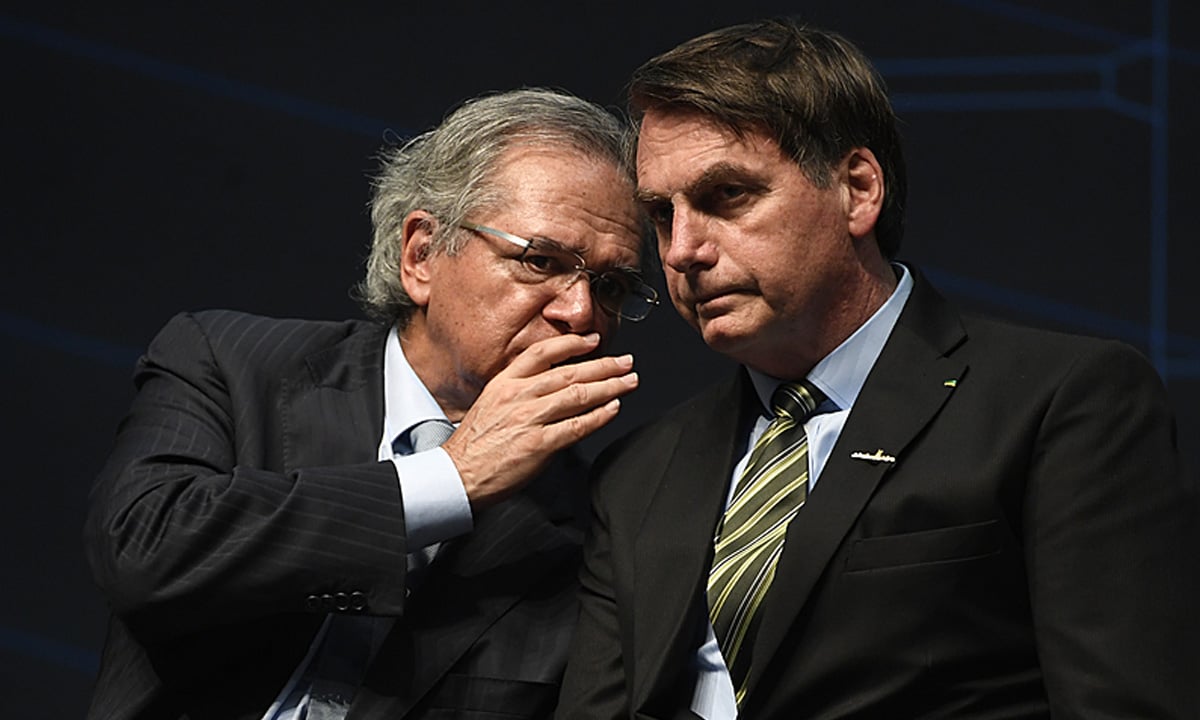 Paulo Guedes e Jair Bolsonaro. Foto: Mauro Pimentel/AFP 