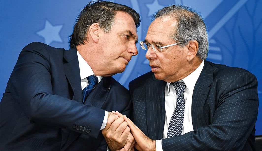 Jair Bolsonaro e Paulo Guedes. Foto: Evaristo Sá/AFP 