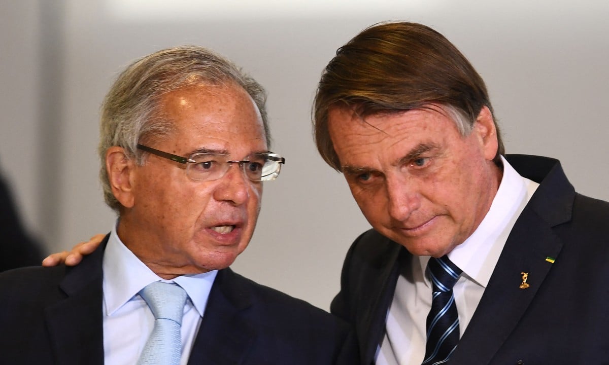 Paulo Guedes e Jair Bolsonaro. Foto: EVARISTO SA/AFP

 