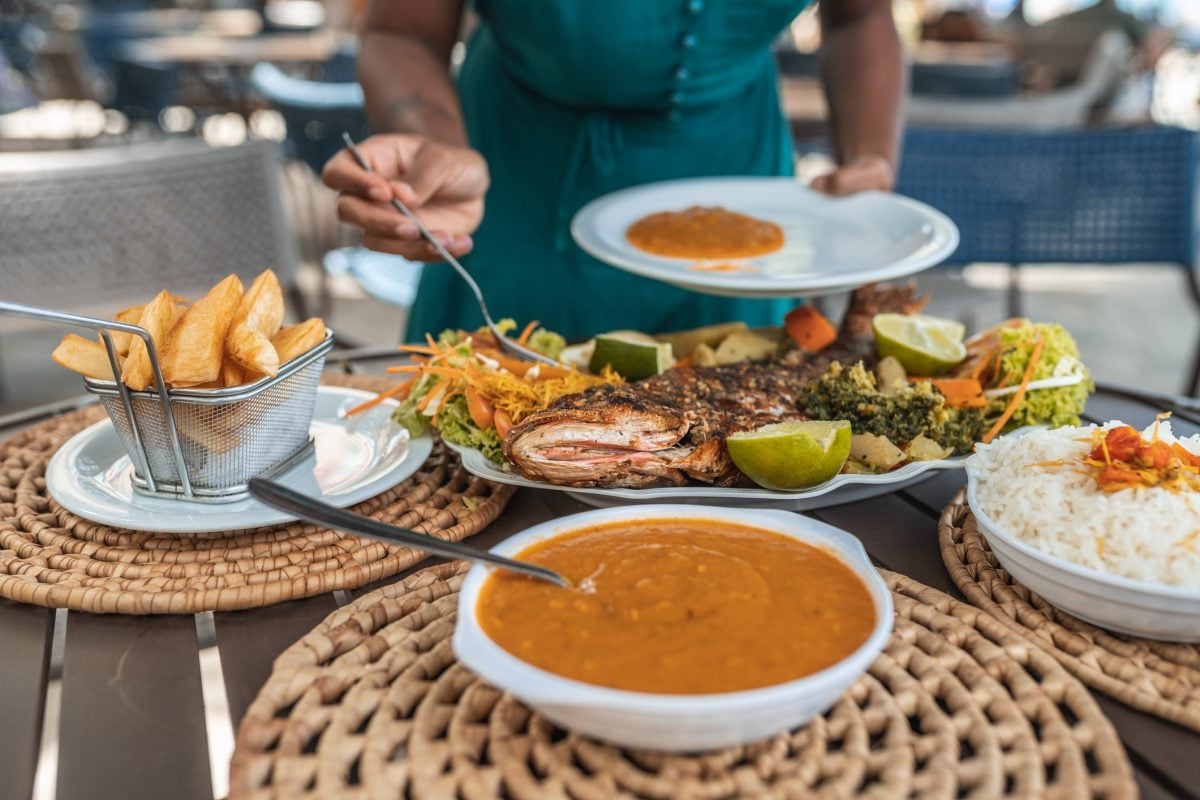 Afro tourist at a tropical Brazilian restaurant in Pernambuco, Brazil 