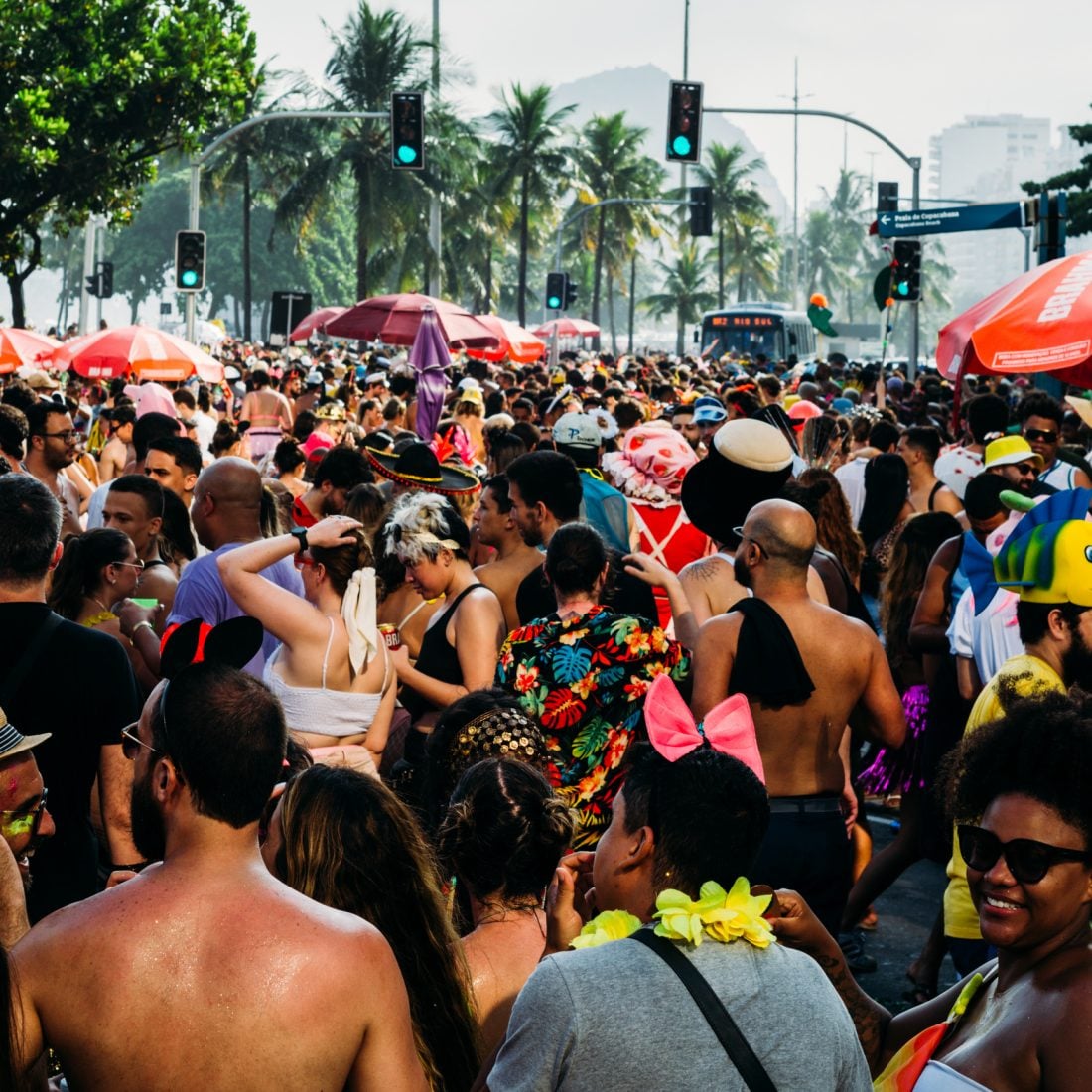 Rio de Janeiro, Brazil - February 19, 2023: Revelers enjoy a carnival street party bloco in Copacabana, Rio de Janeiro, Brazil 
